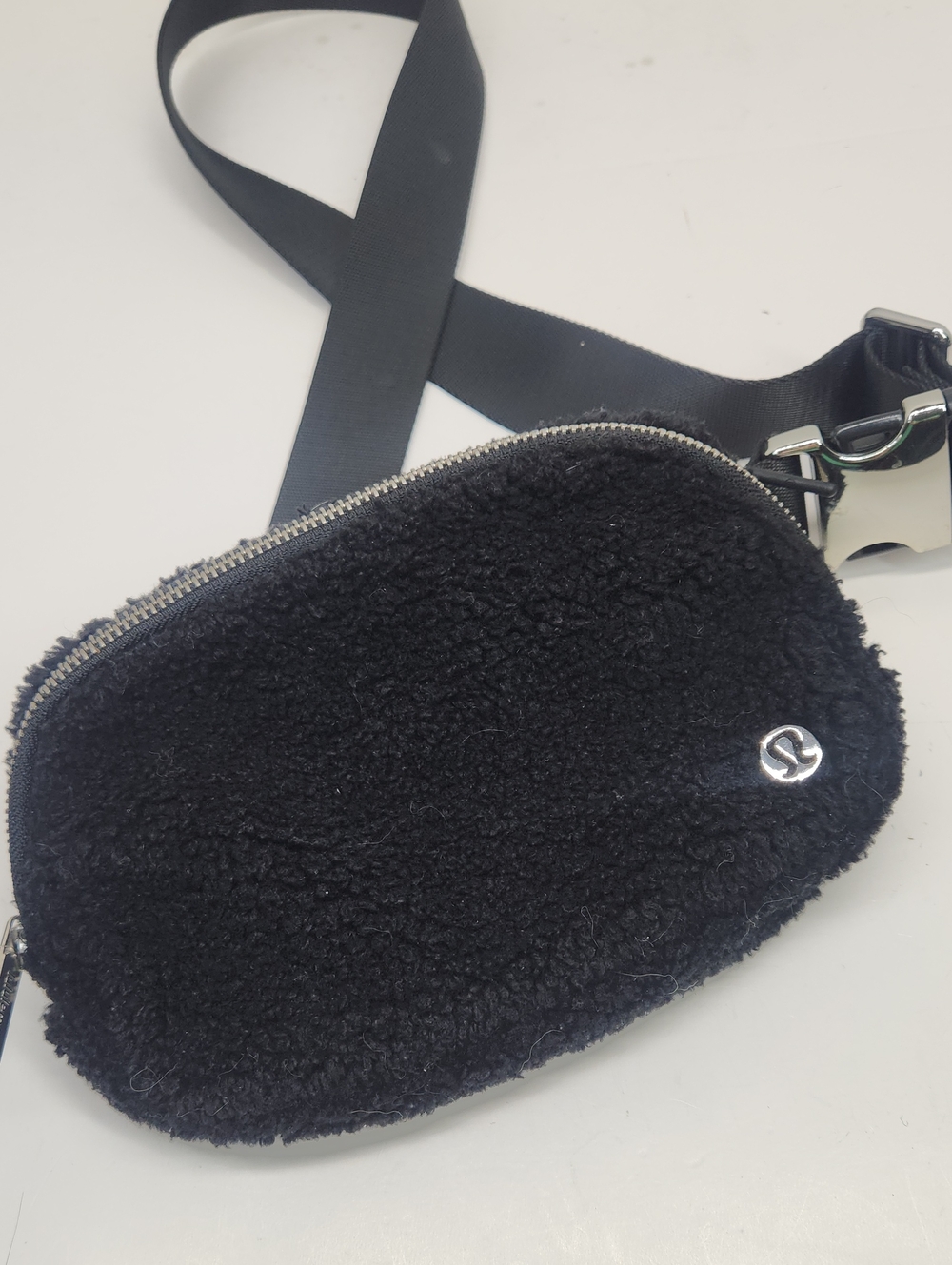 lululemon athletica Black Shearling Crossbody Bag with Silver Logo